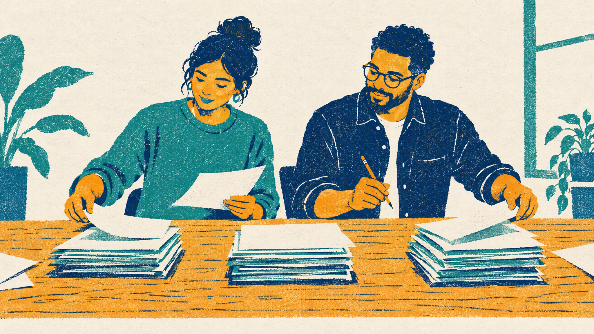 Two colleagues at a long wooden table sort loose papers into three separate stacks while one of them holds a pencil.