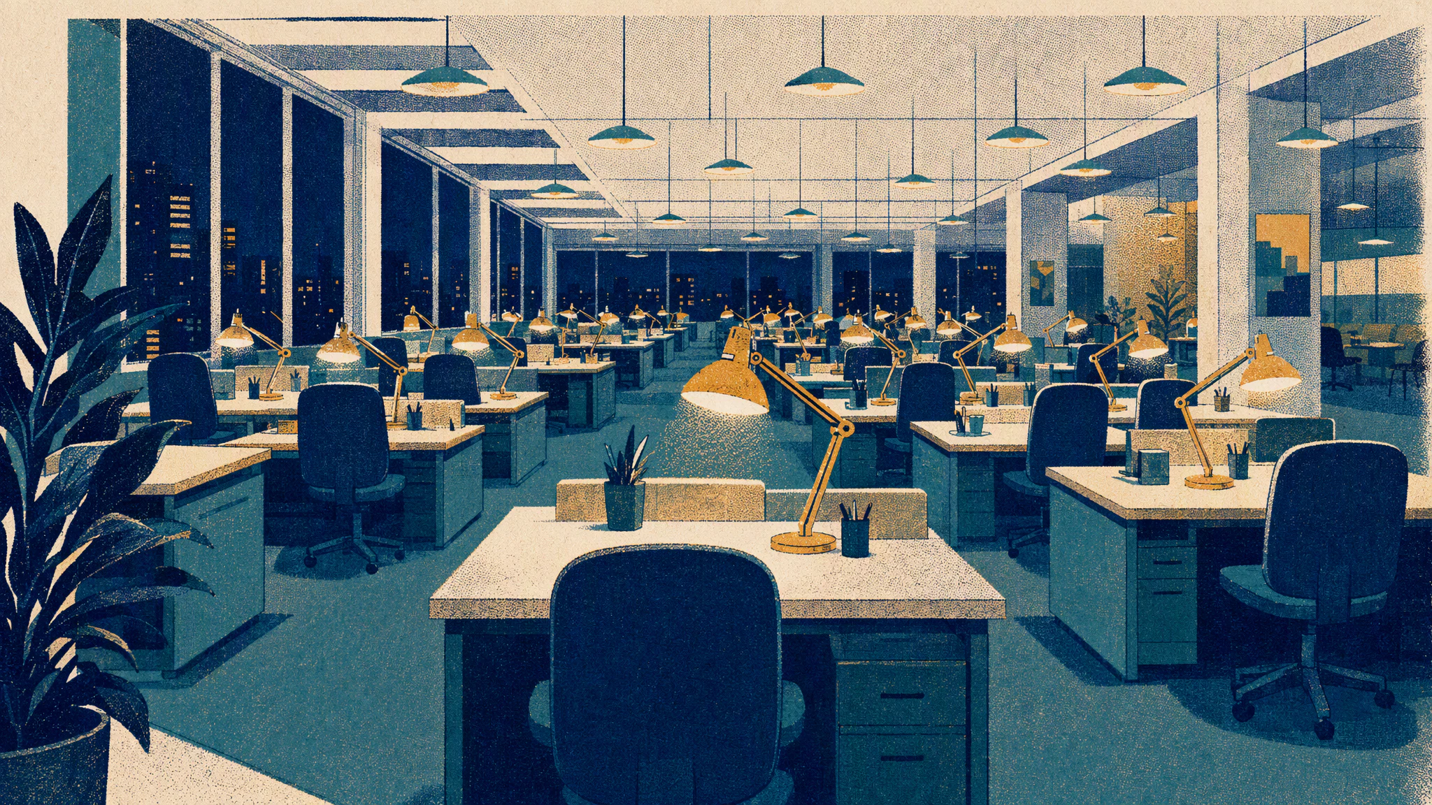 An empty open-plan office late at night with every ceiling light and desk lamp still switched on.